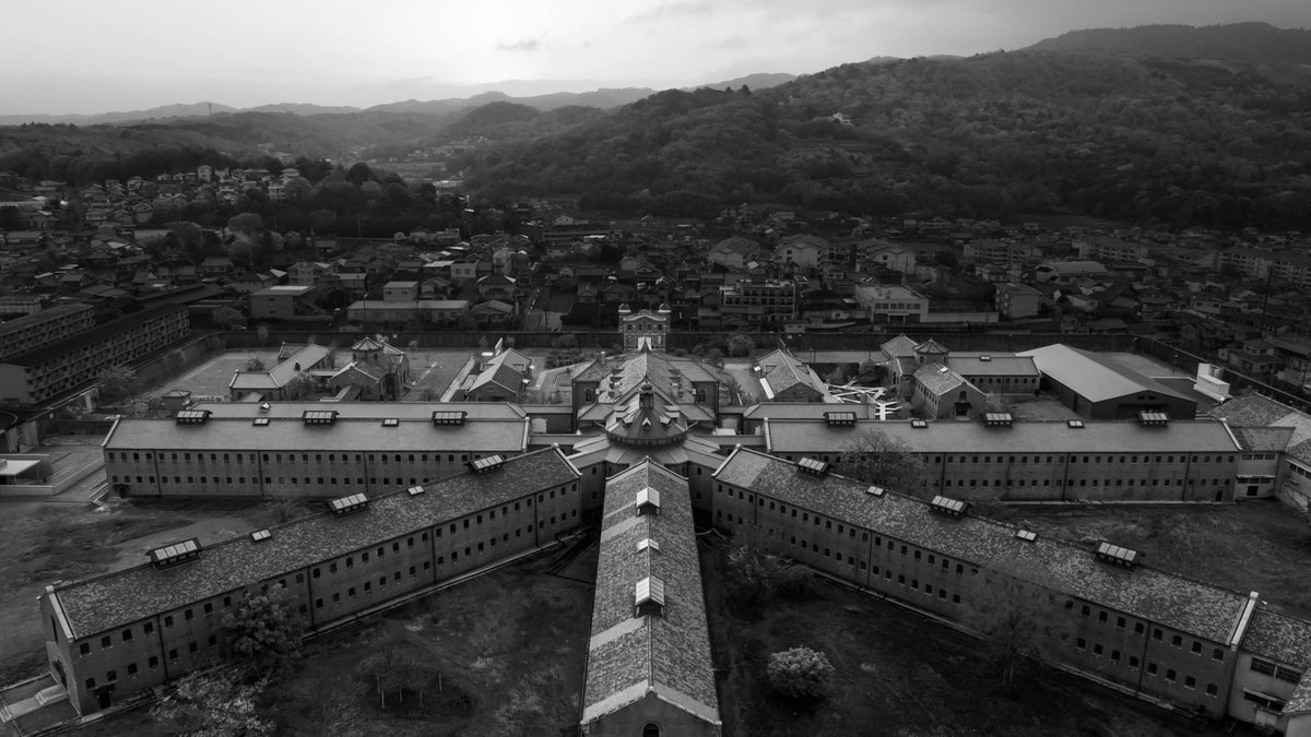 Aerial view of the radial red-brick complex at HOSHINOYA Nara Prison in Nara, Japan