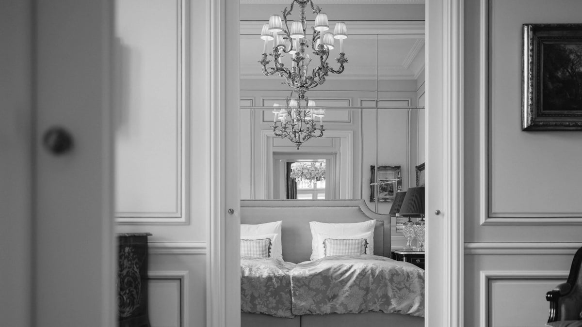 Chandelier-lit bedroom at Hotel Sacher Wien, Vienna