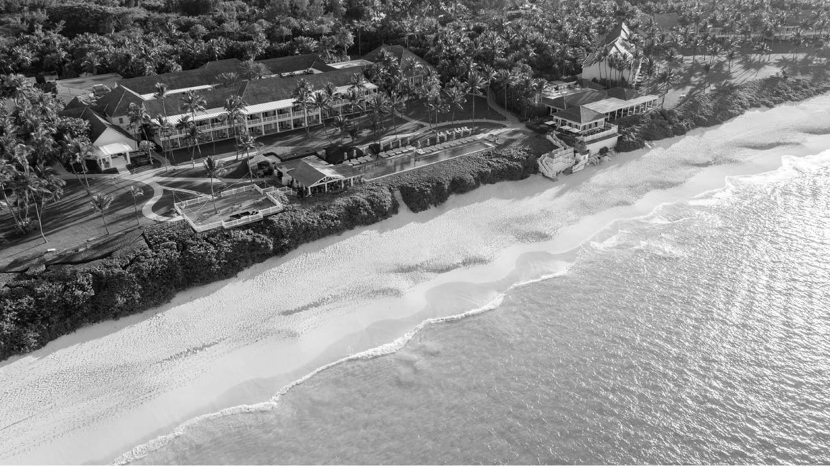 Aerial view of The Ocean Club, A Four Seasons Resort, Bahamas, with its beach, palms and low-rise buildings on Paradise Island.