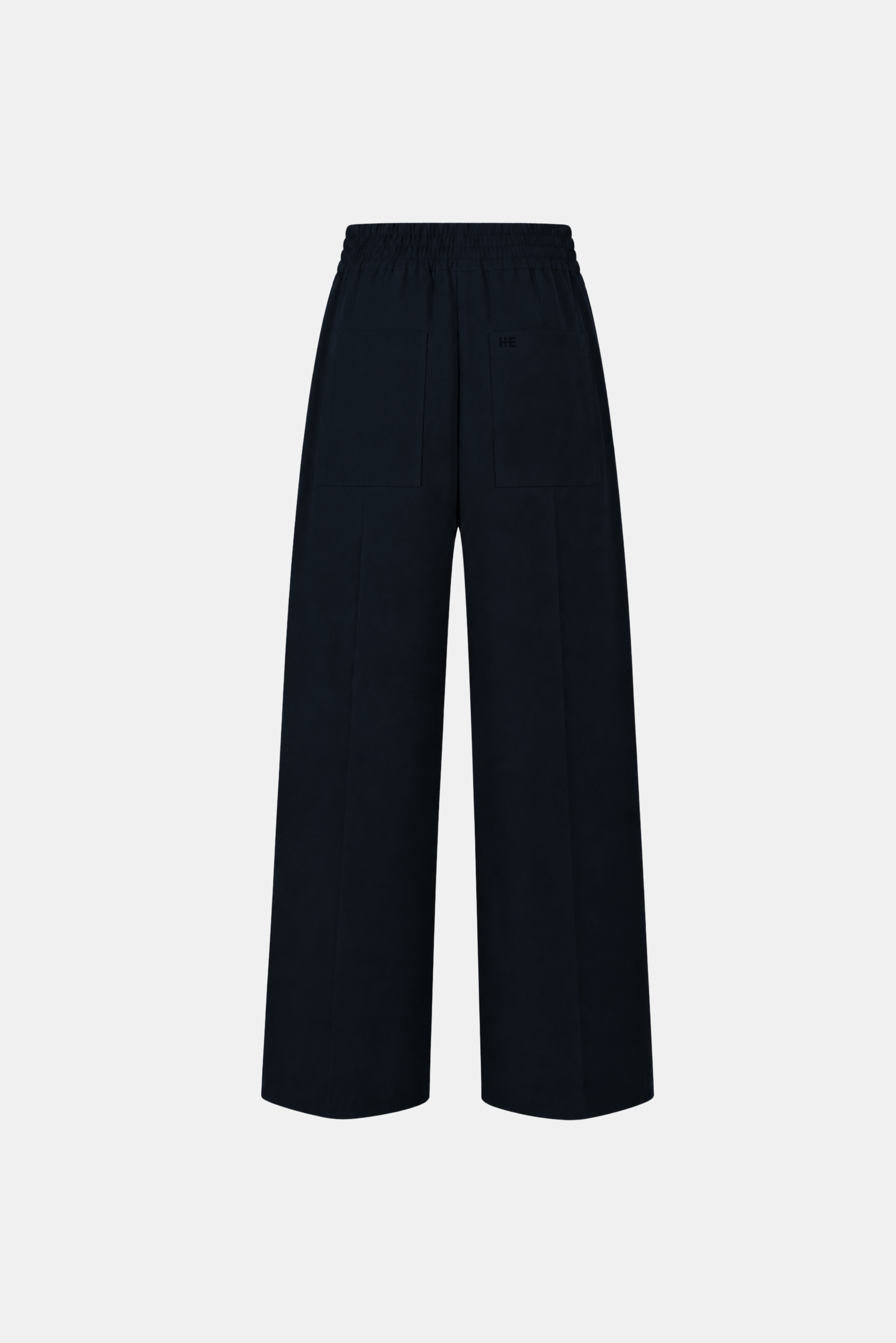 A pair of dark navy wide-leg cropped pants with an elastic waistband, shown against a plain light gray background.