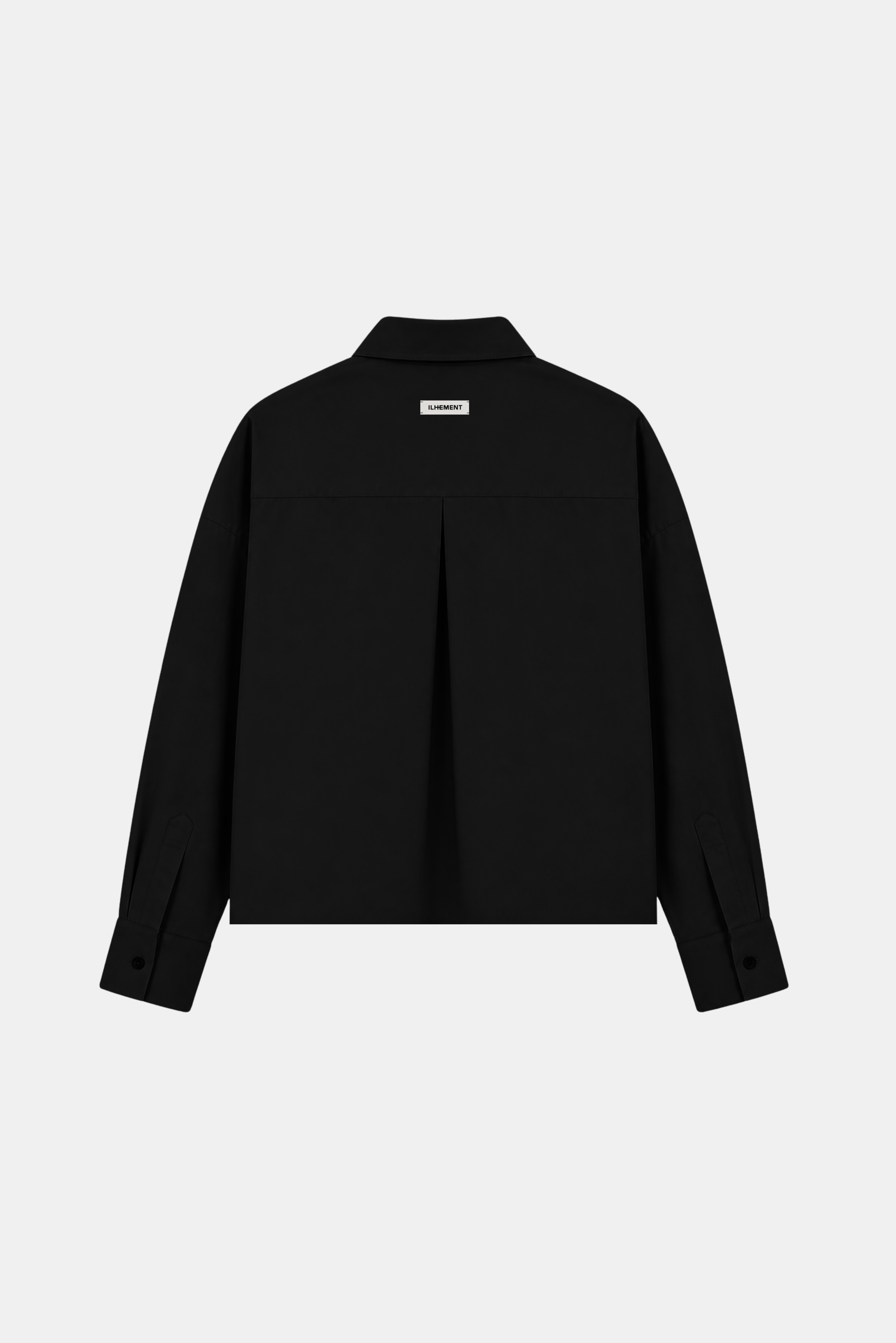 A dark navy blue long-sleeve button-up shirt jacket shown from the back, featuring a subtle vertical pleat detail at the center back and a small rectangular brand label near the collar, set against a solid light gray background.