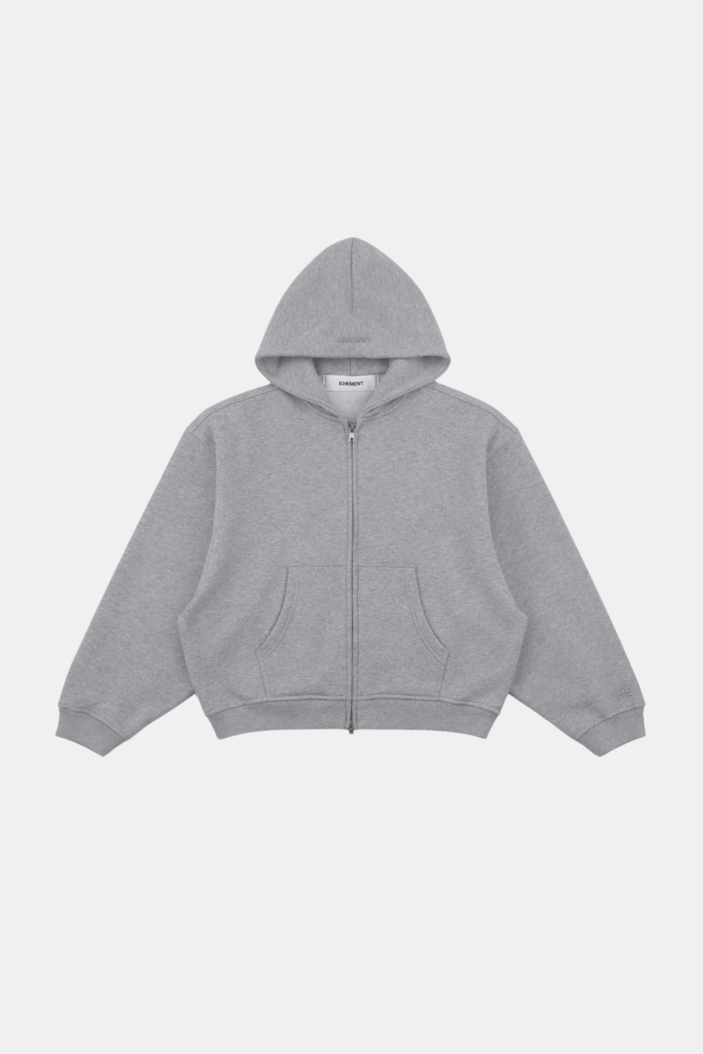 Grey boxy zip hoodie with exaggerated silhouette and tonal wave stitch detail