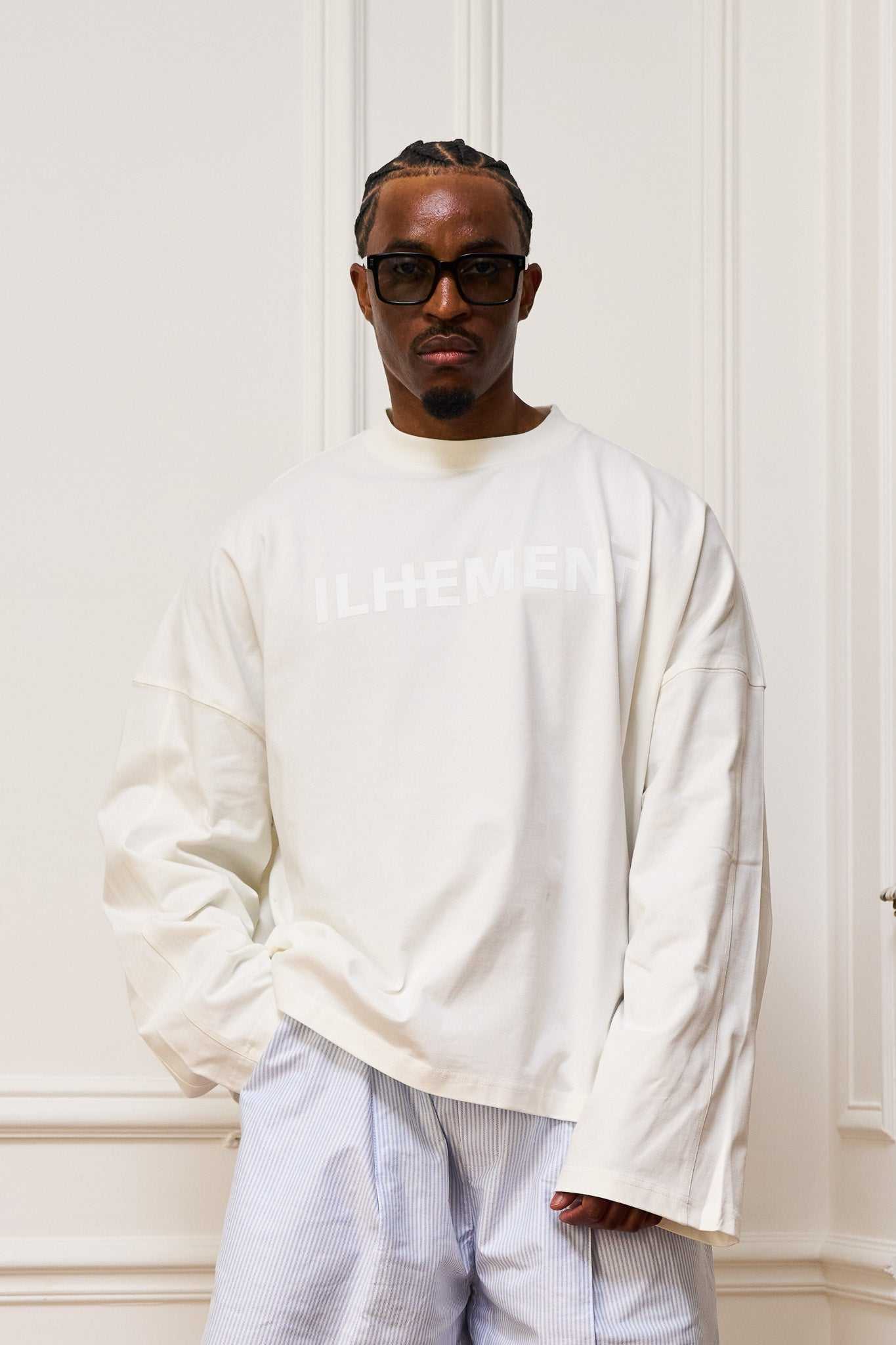 Cropped boxy long sleeve T-shirt with architectural seaming and tonal ILHEMENT logo on chest