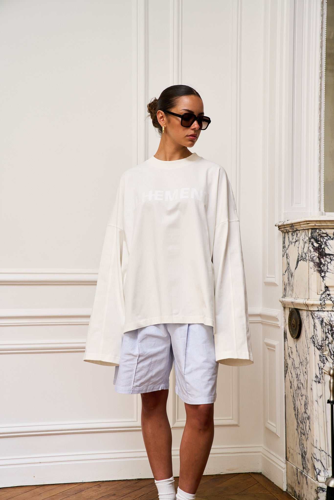Cropped boxy long sleeve T-shirt with architectural seaming and tonal ILHEMENT logo on chest