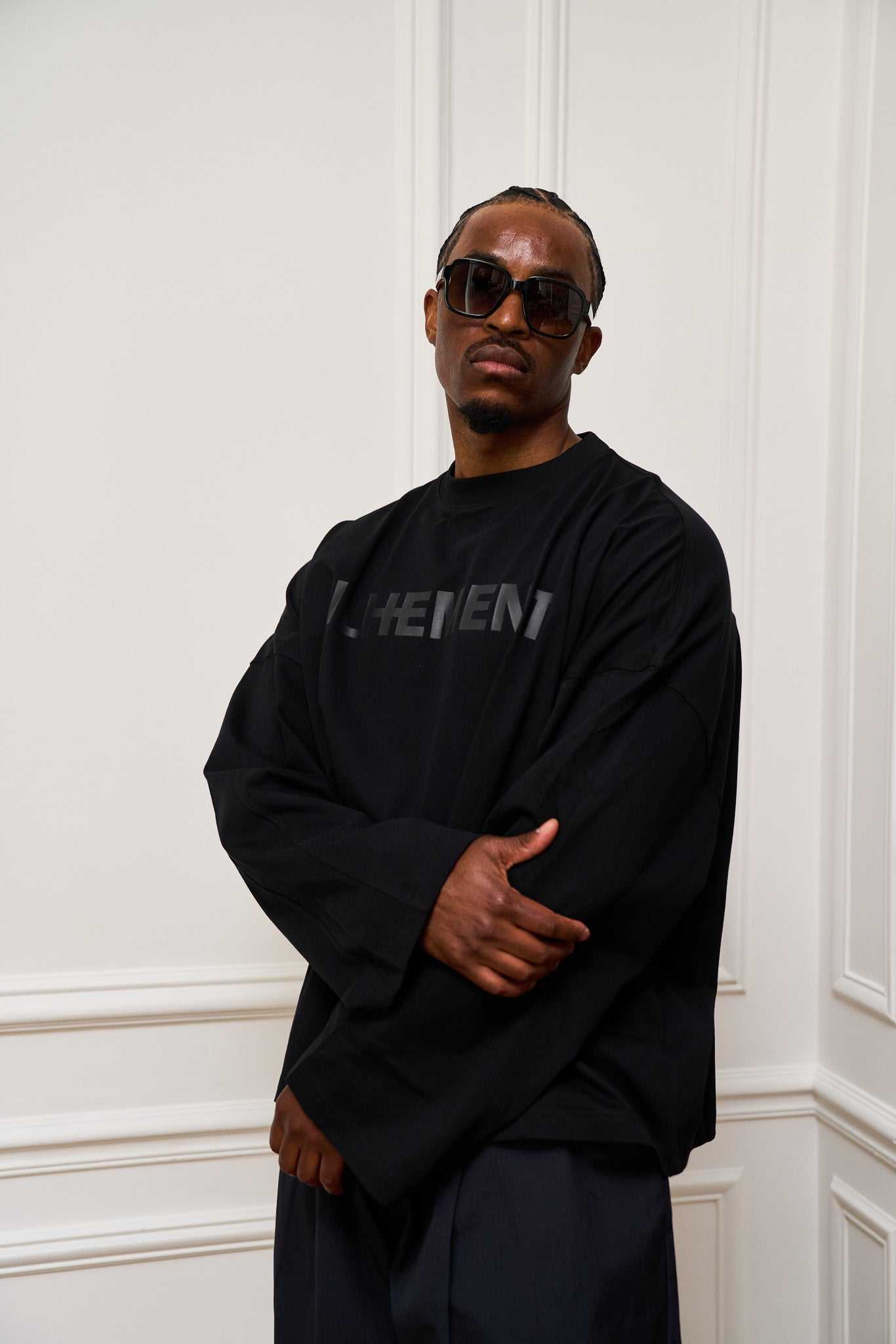 Arias cropped boxy long sleeve cotton T-shirt with architectural seaming and tonal ILHEMENT logo