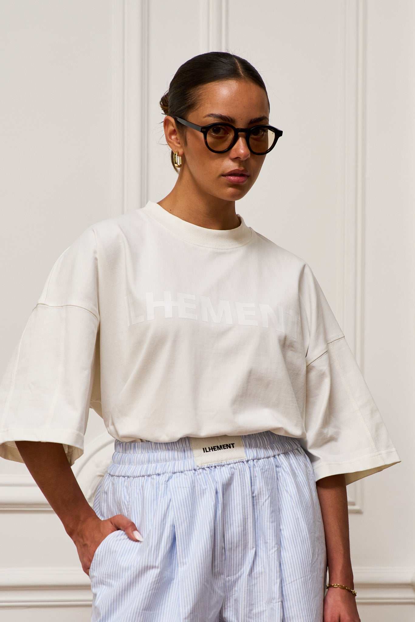 Oversized cropped boxy cotton T-shirt with architectural seaming and tonal ILHEMENT logo