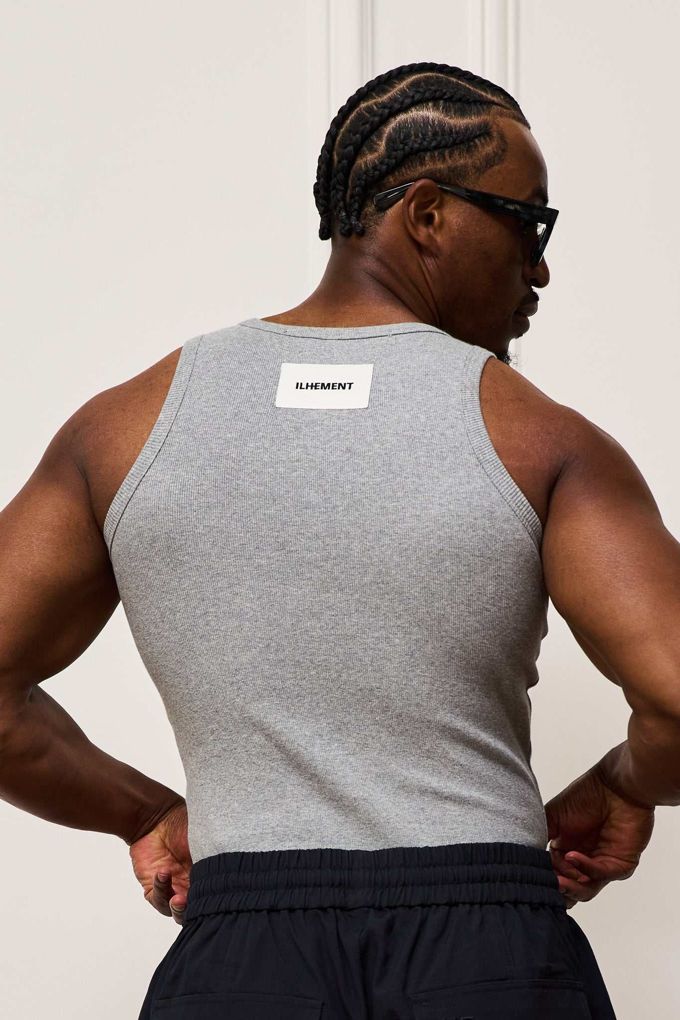 Grey ribbed tank top with stretch cotton blend and clean neckline