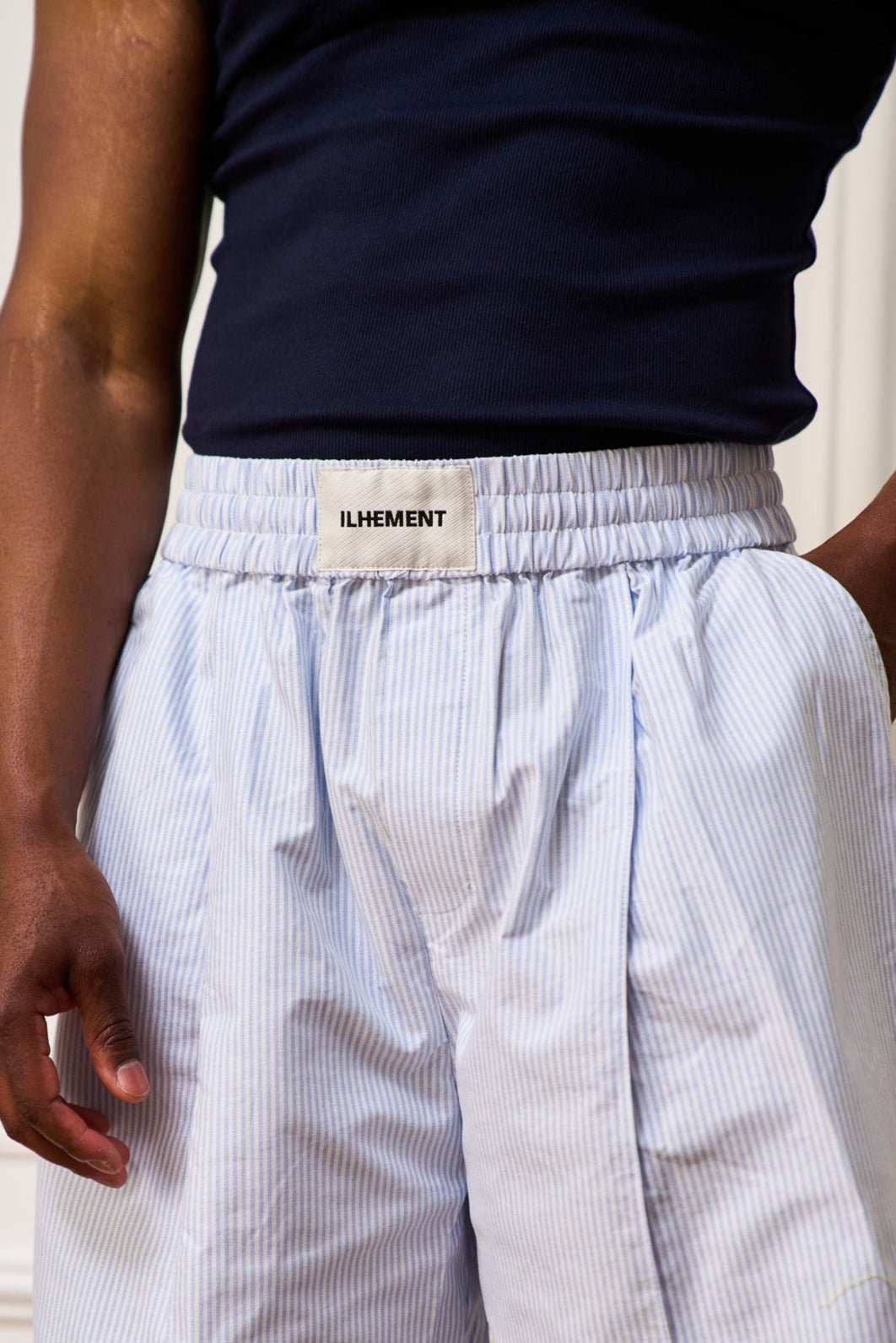 Blue-and-white striped pleated Oxford boxer shorts with flap pockets and tonal embroidery