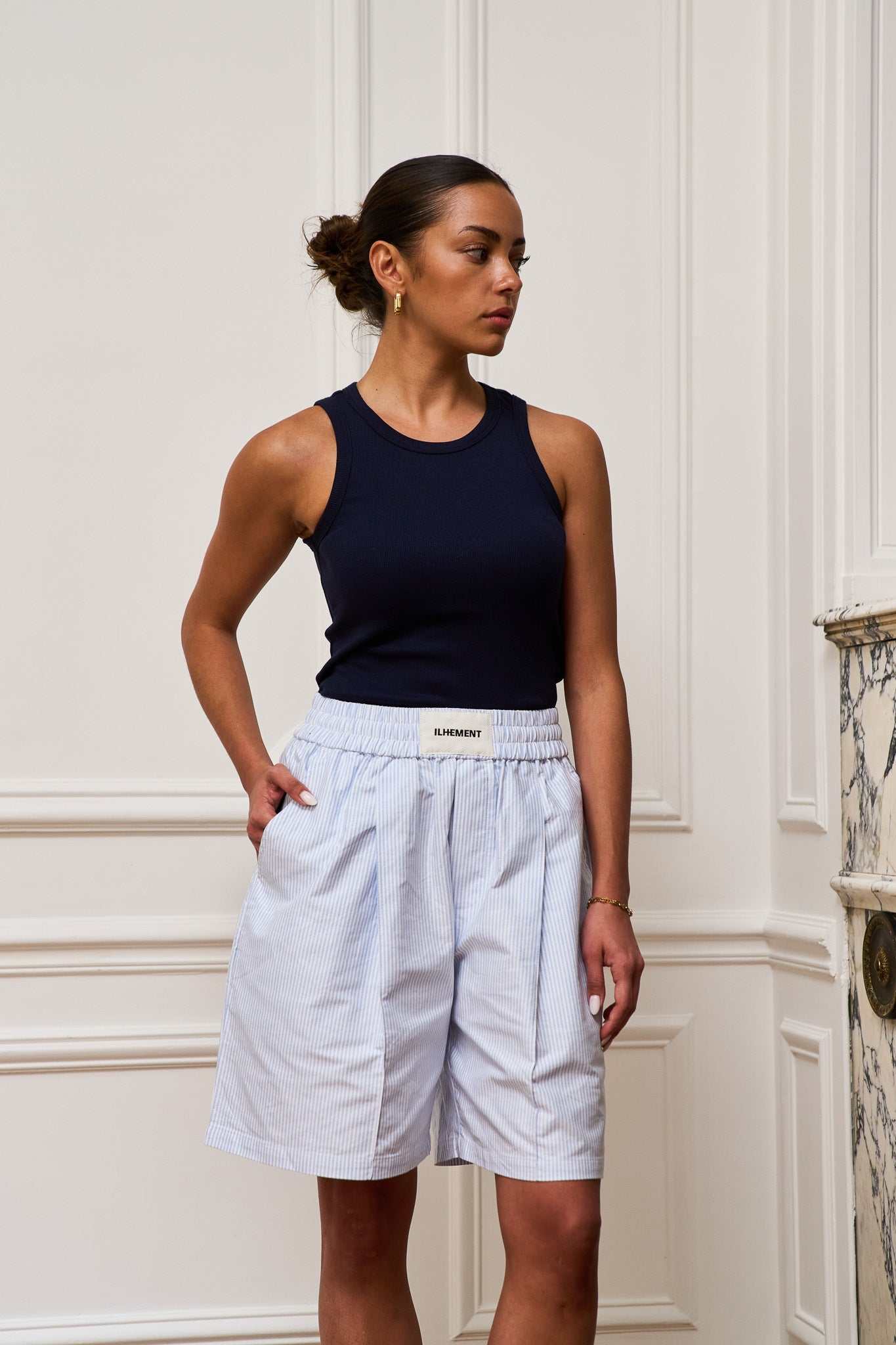 Blue-and-white striped pleated Oxford boxer shorts with wide silhouette and flap pockets