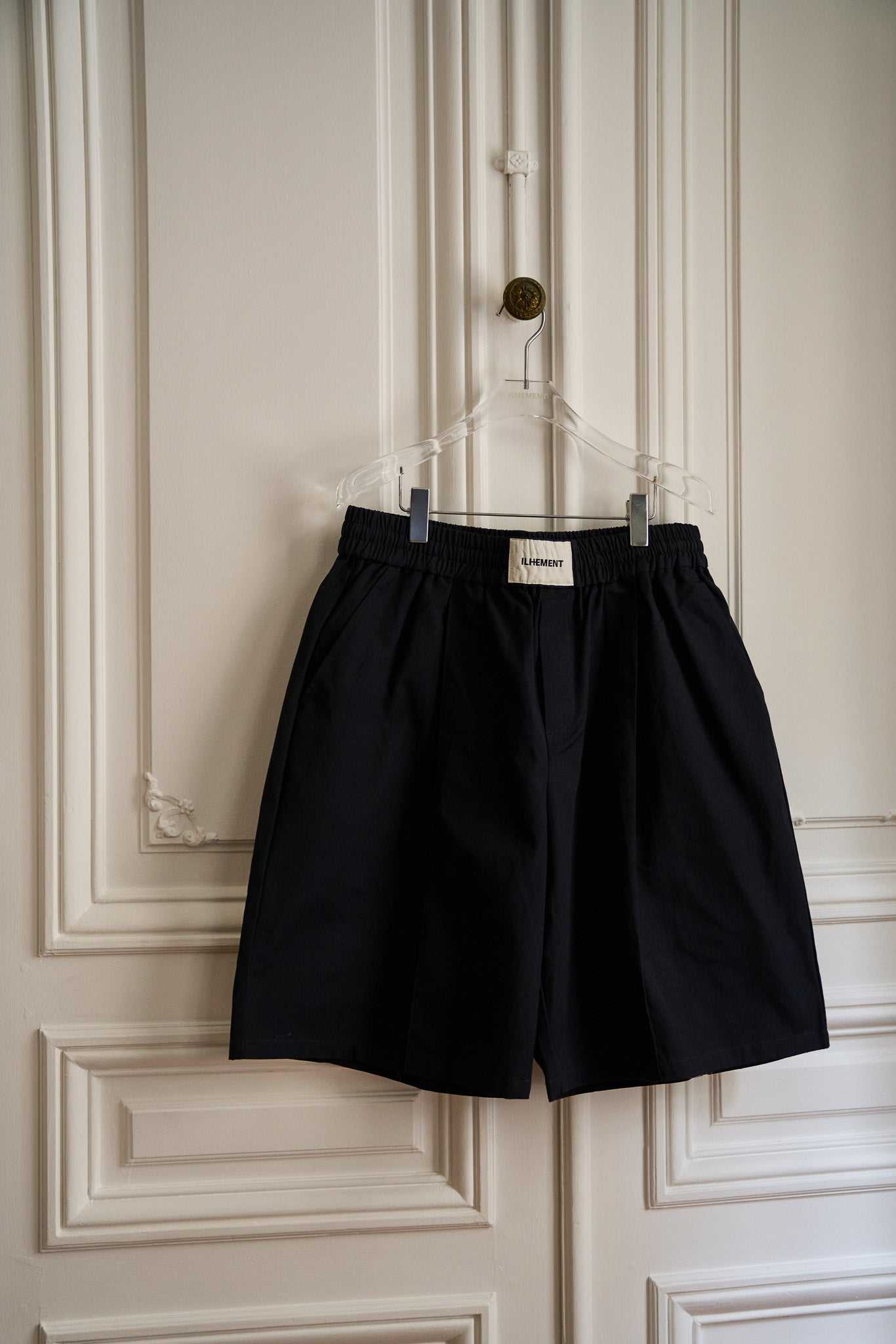 Pleated Ripstop cotton shorts with wide knee-length cut and flap pockets