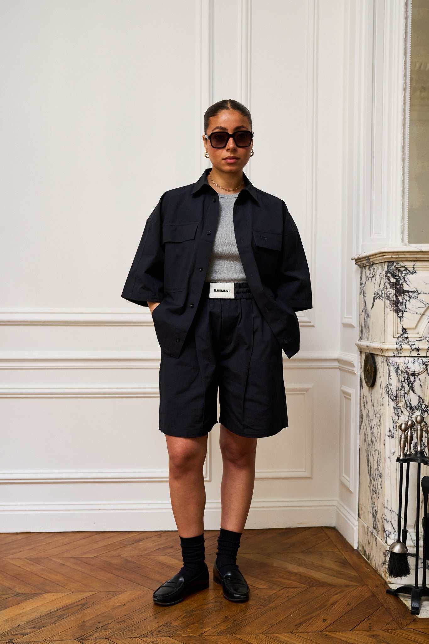 Pleated Ripstop cotton Atlas shorts with flap pockets and tonal embroidery, knee-length wide Bermuda style.