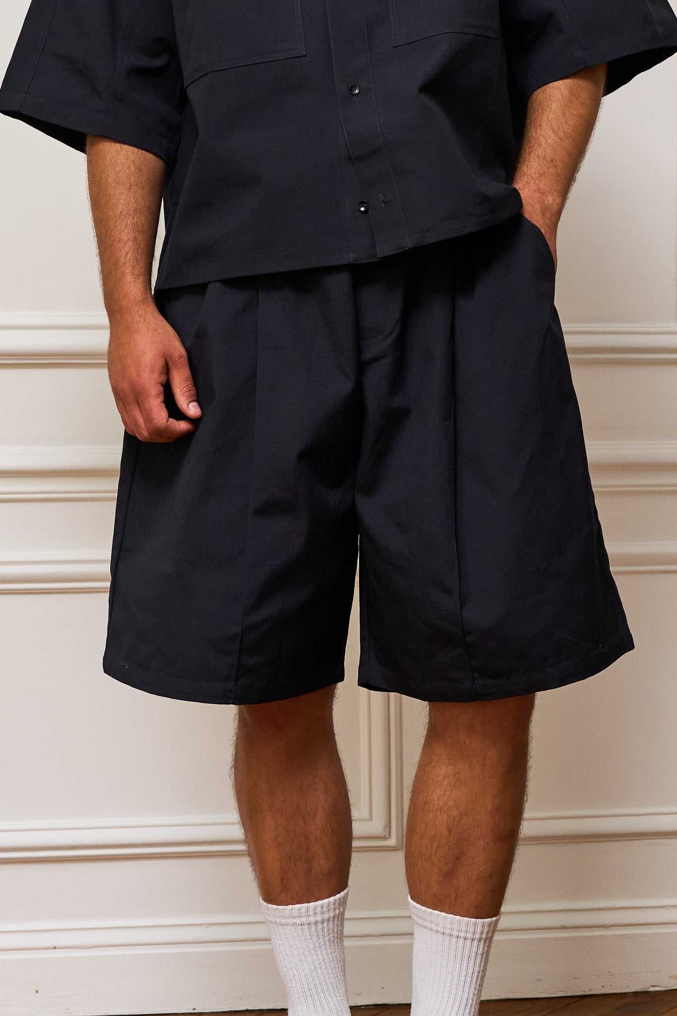 Pleated Ripstop shorts in heavyweight organic cotton with flap pockets and tonal embroidery