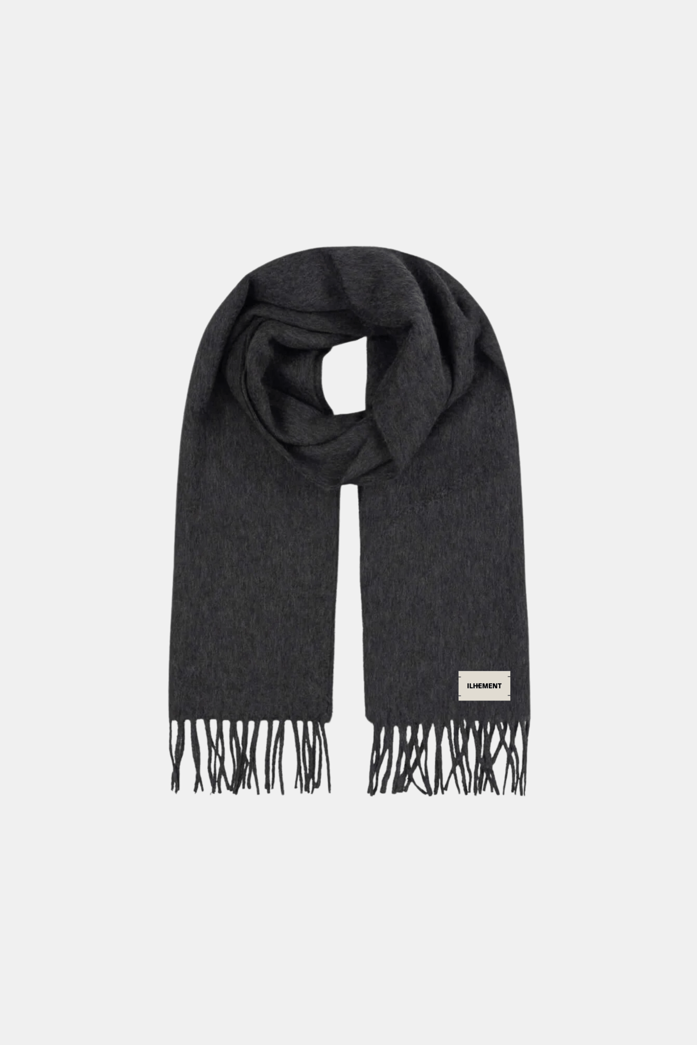 Wide cashmere scarf styled for travel and casual city wear with sunglasses