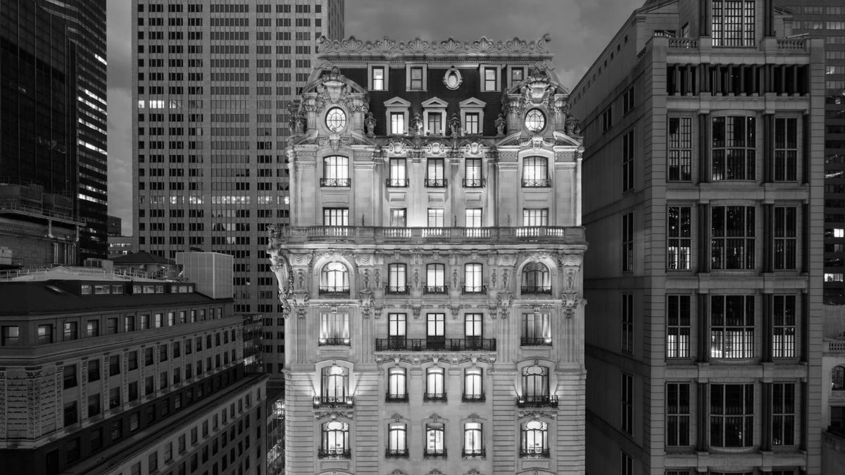 Illuminated Beaux-Arts exterior of The St. Regis New York on East 55th Street