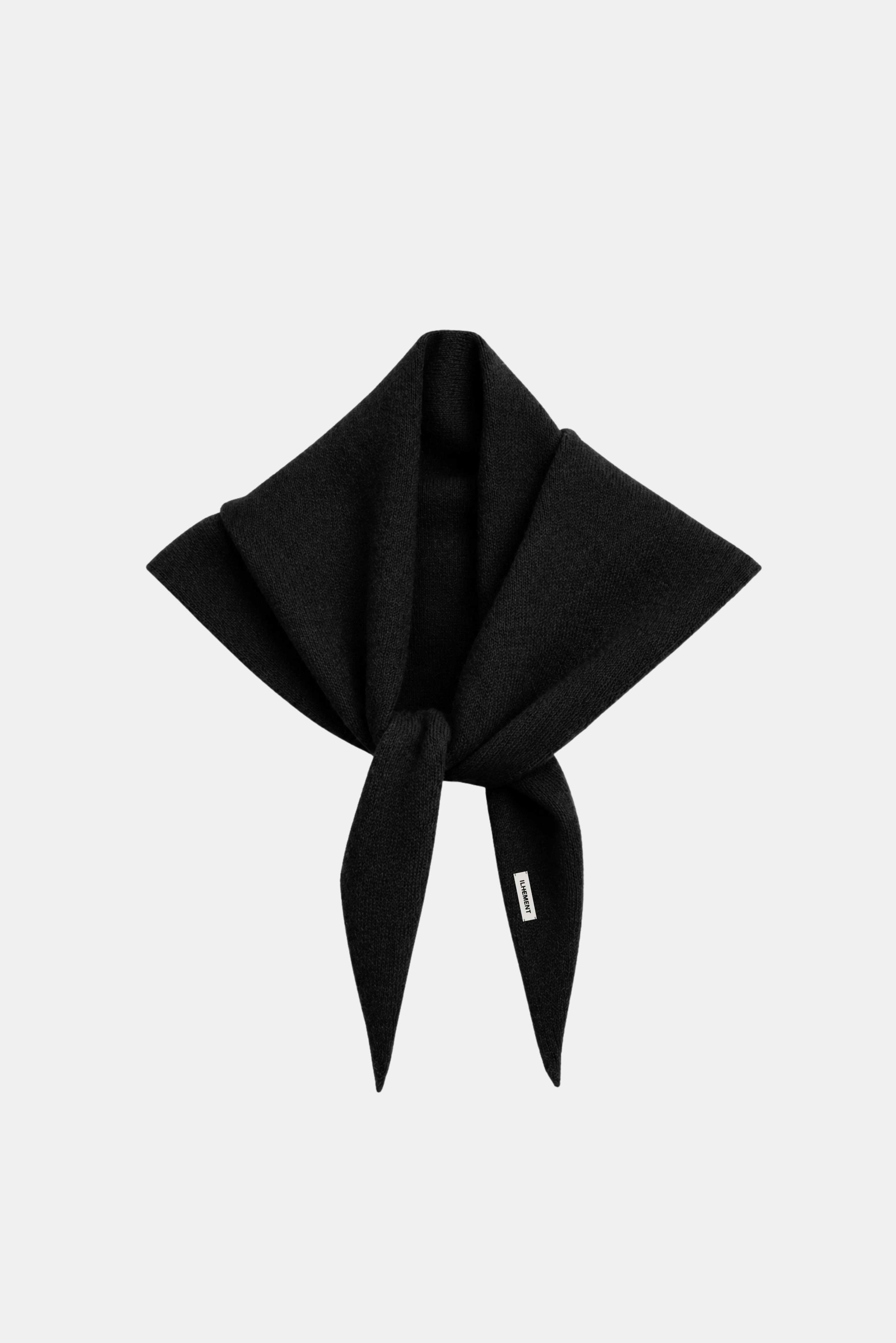 A black square scarf tied in a knot, displayed flat against a light gray background.