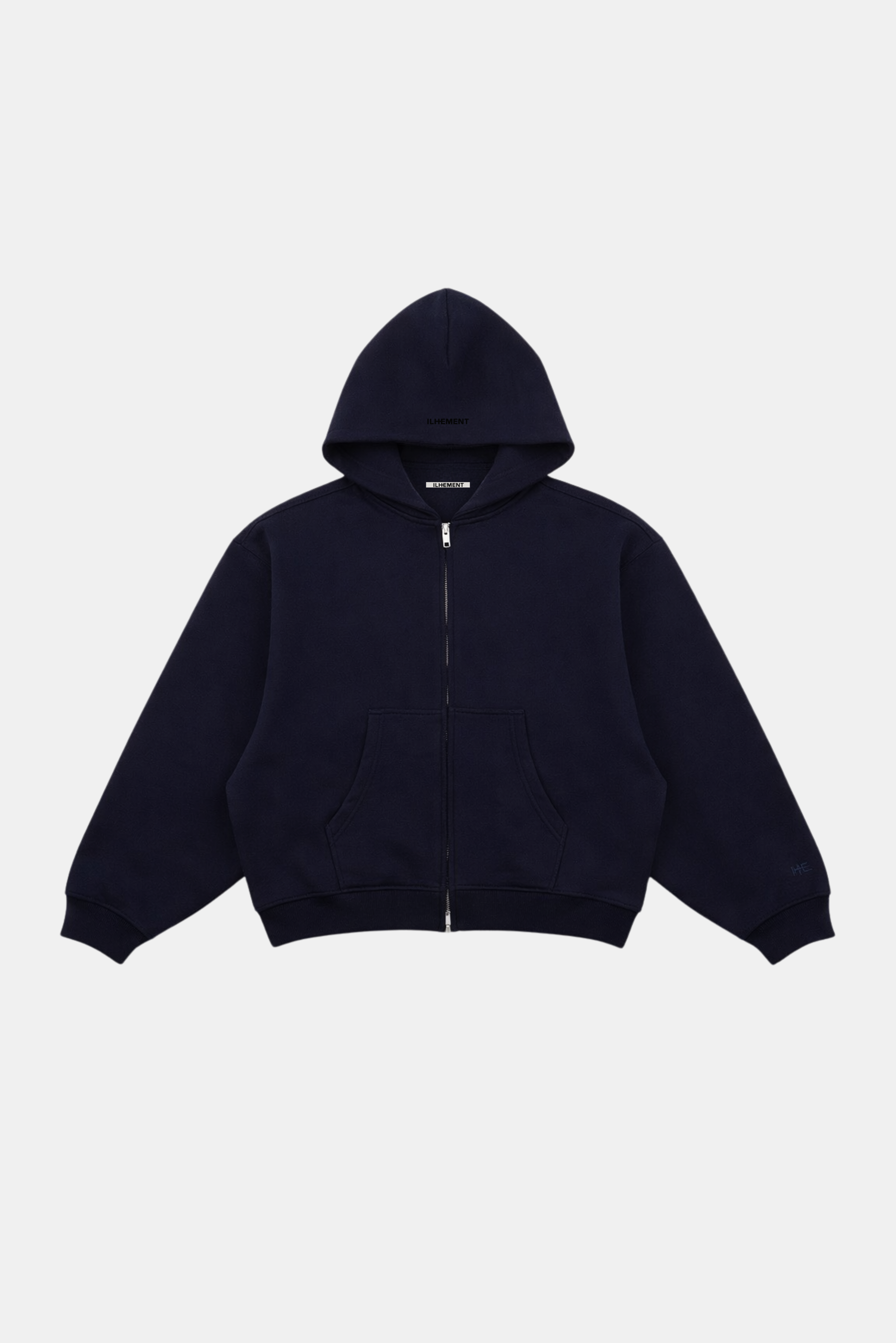A dark navy blue zip-up hoodie with a front zipper, hood, and split kangaroo pockets, with a tonal embroidery, displayed against a light gray background.